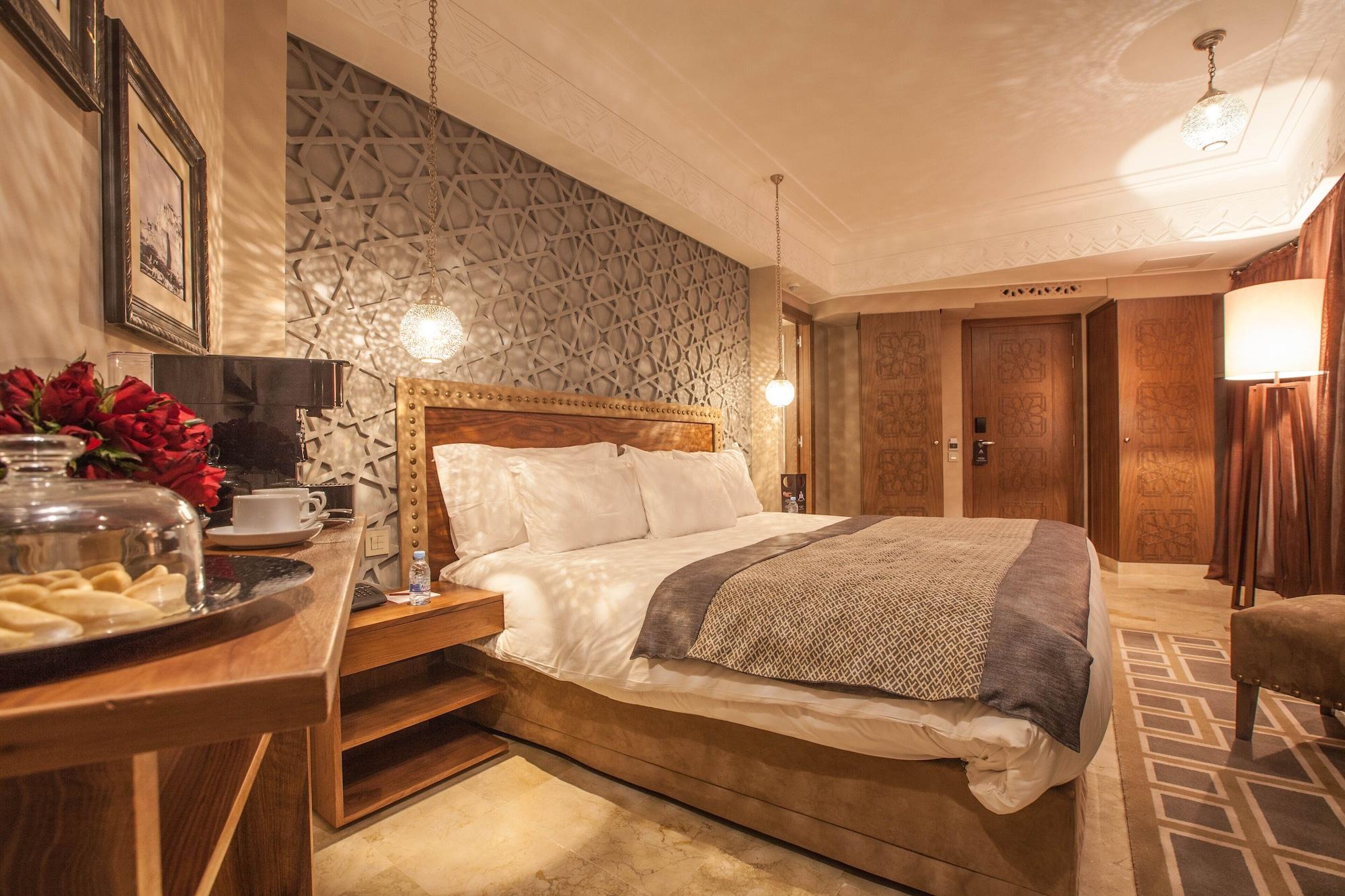 イヴェルナージュ ホテル アンド スパ マラケシュ エクステリア 写真 A bedroom at the hotel
