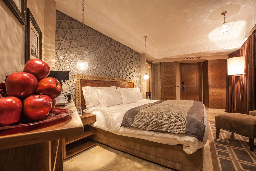 イヴェルナージュ ホテル アンド スパ マラケシュ エクステリア 写真 A bedroom at the hotel